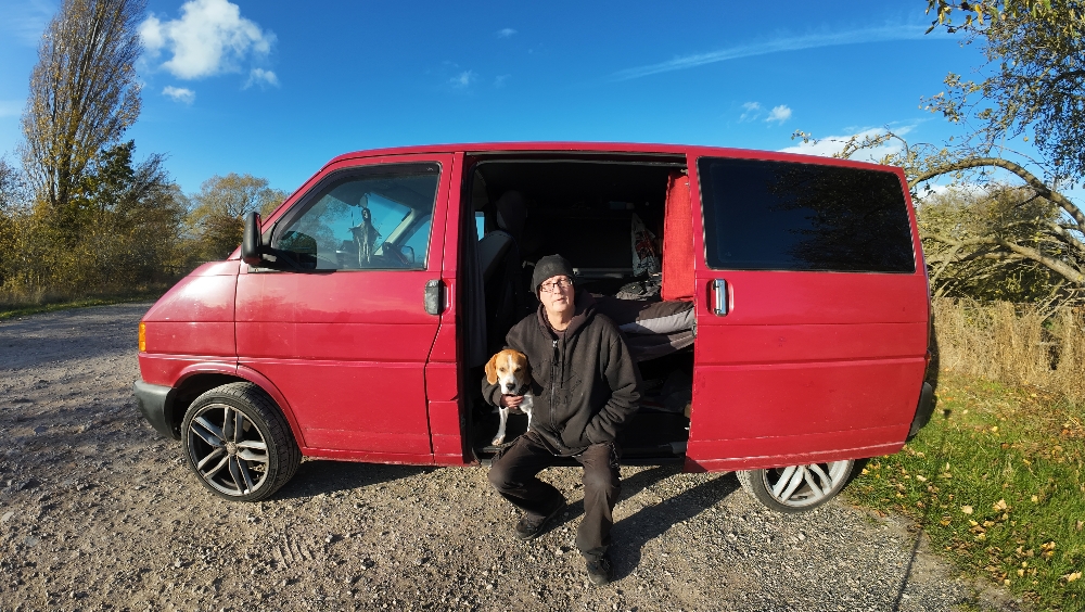 Kris and Loki the beagle with their VW T4 van